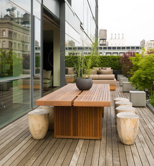 Long-Wooden-Table-and-Stone-Chairs-Sets-with-Beautiful-Garden-in-Outdoor-Patio-Furniture-Designs